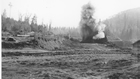 The oil sands at Abasand were so hard and abrasive that they wore out the teeth on excavators. It was necessary to blast the deposit before it could be quarried and taken to the plant for processing. Source: University of Alberta Archives, 85-22-15
