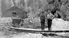 Absher’s Camp, 1930; Absher stands on the left. Source: Provincial Archives of Alberta, A3543