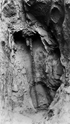Absher’s Camp, 1930; at the suggestion of Karl Clark, the pipe was dug out after one experiment in order to determine why the pipes burnt. Source: Provincial Archives of Alberta, A3545
