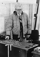 Frank K. Spragins at a Syncrude control board, 1978. Source: Glenbow Archives, NA-5059-2