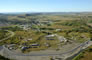 The completed berm encircling the Turner Valley Gas Plant Historic Site, n.d. <br />Source: Alberta Culture and Tourism