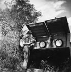 Pipelines were inspected regularly to ensure that the seams connecting the pipes held, and that there were no leaks. John Gold was a pipeline walker—he walked the route of the pipeline from Turner Valley to Calgary, checking gauges and looking for leaks, ca. 1947-1948. <br />Source: Glenbow Archives, IP-14a-1884