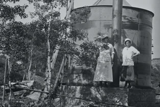 Girls stand on a condenser