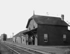 The Okotoks train station, ca. 1910; the Canadian Pacific Railway line through Okotoks was the closest railway to Turner Valley. Supplies and equipment were transported by rail to Okotoks and then by horse and wagon, and later trucks, to the Turner Valley plant site and oil wells. <br />Source: Glenbow Archives, NC-26-249
