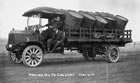 A large truck hauls barrels of oil from the Dingman No. 1 well to Calgary the day after the well blew in, May 1914. Although used in limited numbers, trucks provided transportation from the earliest days of Turner Valley’s development. <br />Source: Glenbow Archives, PA-3689-1
